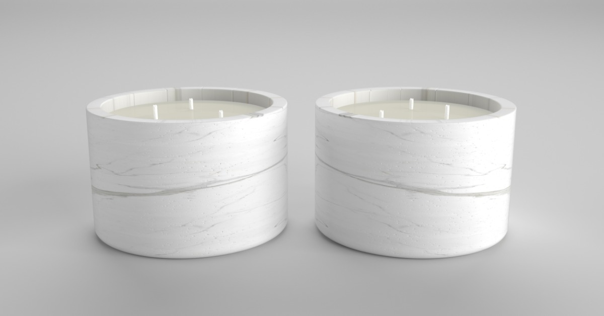 Elegant marble candles are arranged to create a calming spa decor display set against a white background.